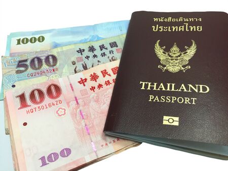 Taiwan banknote and Thailand passport - horizontalの写真素材