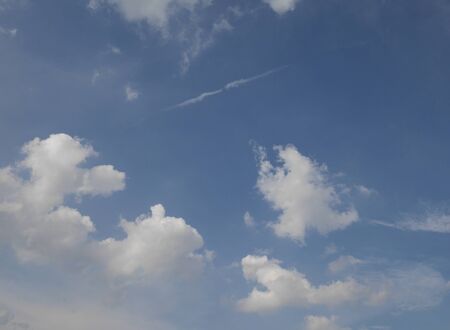 Fluffy clouds in the blue sky
