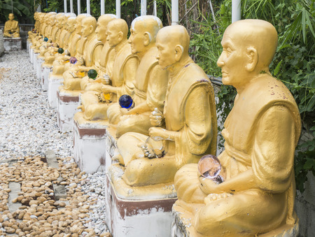 Buddha statues in the temple at Bangkok in Thailandの写真素材