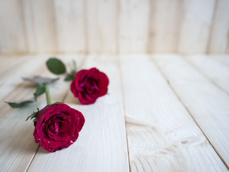Red rose and heart shape on wood background for love concept, Valentines dayの写真素材