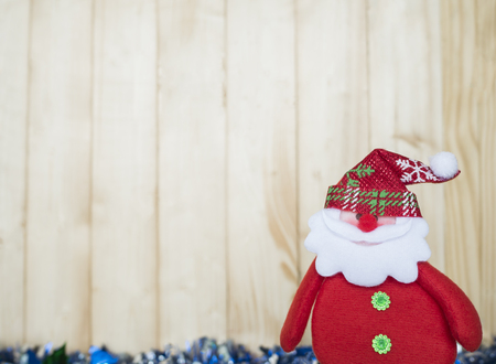 One Santa Clause decoration on wood background (Christmas Holiday)の写真素材
