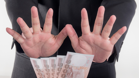 Businessman decline a bribe on isolated / white background. Stop corruption and fraud conceptsの写真素材