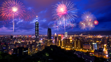 Firework with cityscape night light view of Taipei. Taiwan city skyline at twilight time, public scene from view point at the Mountain.のeditorial素材
