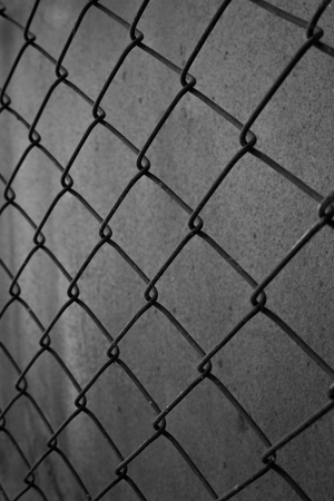 chain link fence on Grey backgroundの写真素材