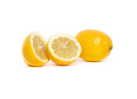 A Whole Lemon and Two Lemon Halvesの写真素材