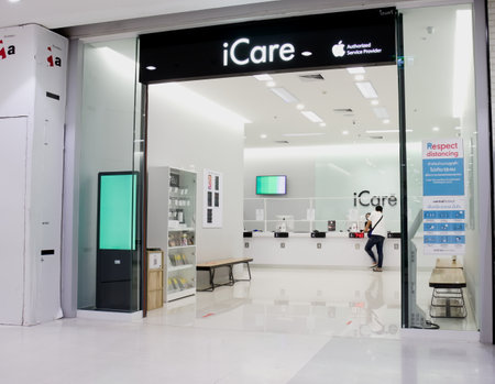 Bangkok, Thailand - December 5, 2020 : iCare shop, the Apple Authorised Service Provider (AASP), with expert Apple Certified Technicians providing repair & service for all Apple products.のeditorial素材