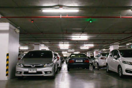 Smart parking guidance in department store with light overhead. Car lot.のeditorial素材