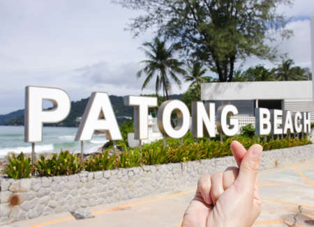 Patong Beach Sign landmark of Patong Beach at Phuket, Thailand. With finger heart concept: travel destination.の写真素材