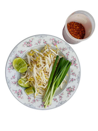 Mix vegetable side dish, mung bean sprouts, lime, chives and red chile. Thai style food.の写真素材