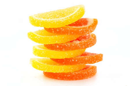 Colored marmalade  slices  on a white background close-up