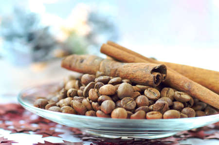Christmas card with coffee beans and cinnamon close-upの写真素材