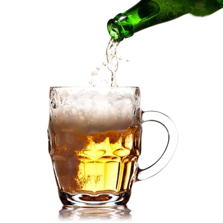 pint mug of beer on white backgroundの写真素材