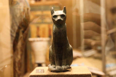 Saint petersburg, Russia - SEP 13, 2016: old bronze statue of goddess Bastet as a cat from ancient Egypt. Front view at the hermitage museum in Saint Petersburg, Russia.のeditorial素材