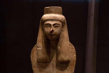 Leiden, The Netherlands JAN 26, 2019: closeup of an ancient egyptian statue of Meretseger as Cobra...