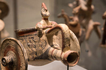 Leiden, The Netherlands - JAN 04, 2020: closeup of small terracotta warrior chariot figurine made...