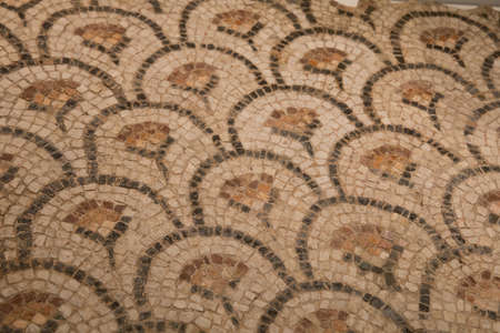 Leiden, The Netherlands - JAN 04, 2020: closeup of ancient roman mosaic tiles. Roman empire art.のeditorial素材