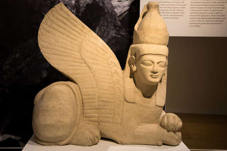 Leiden, The Netherlands - JAN 04, 2020: a stone burial Sphinx statue with egyptian pschent crown...