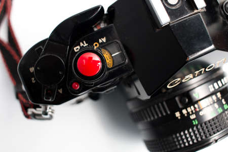Schiedam, The Netherlands - NOV 16, 2019: closeup of the top of a vintage analogue photo camera with a white background. Canon A-1 SLR camera.のeditorial素材