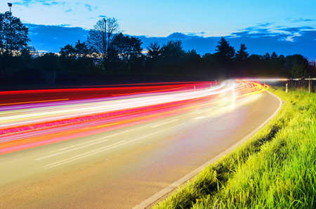 car light trails in suburban area