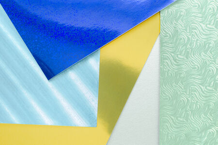 shiny textured construction paper sheets thrown together