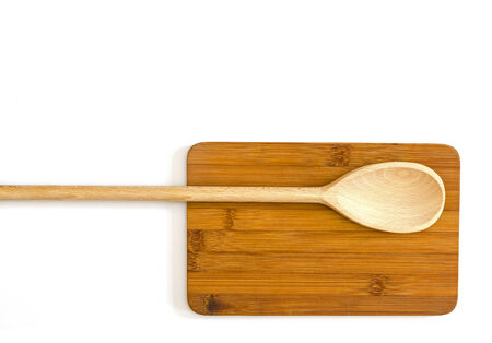 wooden cutting board with a spoonの写真素材