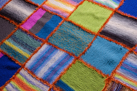 section of a colorful handmade quiltの写真素材