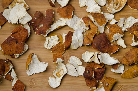 dry citrus peel on wooden tableの写真素材