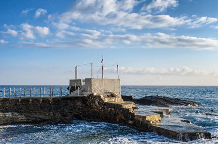jetty with a platform facing the mediterranean sea on a beautiful  sunny day in Genoa Nerviの写真素材