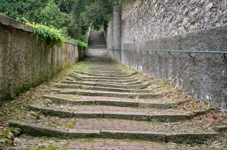 old stone stairs in the monumental Cemetery of Staglieno in Genoa, Italy