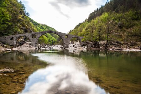 The Roman Architecture Bridge in Ardino, Bulgaria Rhodope Mountains, part of space way Devil's Bridgeの写真素材