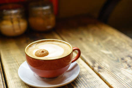 Cappuccino Coffee in wooden table, ukの写真素材