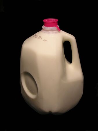 Milk on a dark backgroundの写真素材