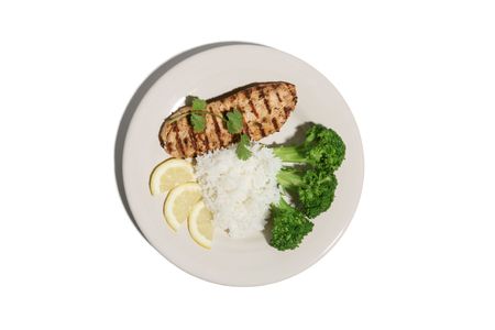 Chicken dinner with rice and veggiesの写真素材