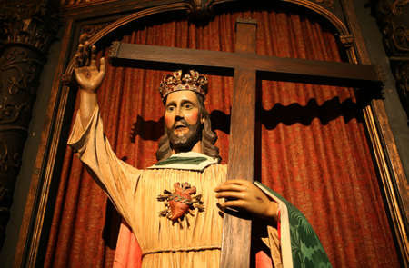 Jesus holding the cross