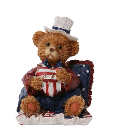 Patriotic bear holding heart over whiteの写真素材