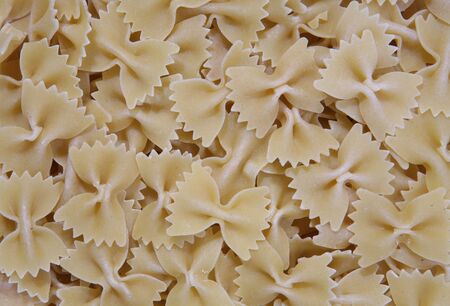 A background made up of bowtie pasta