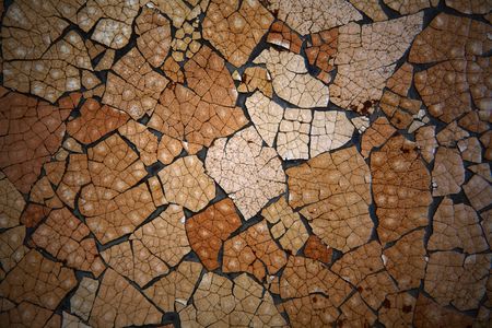 A background texture with many cracks and colors