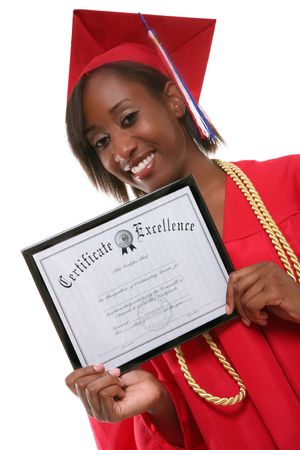 A pretty woman holding her certificate at graduationの写真素材
