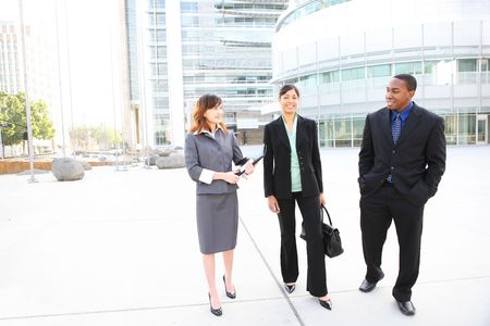 An attractive team of diverse business people at company office buildingの写真素材