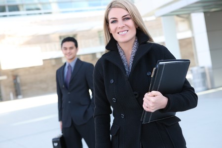 A pretty business woman walking to work at the office building
