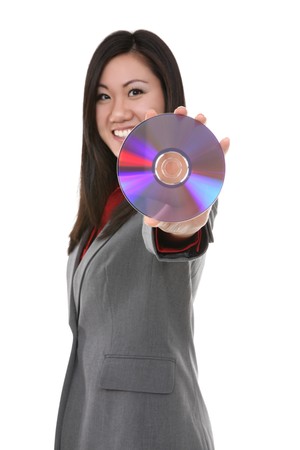 A pretty asian business woman holding dvd cd discの写真素材