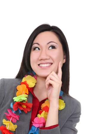 Pretty business woman dreaming of vacation plansの写真素材