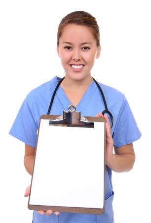 A pretty asian woman nurse isolated over white with clipboardの写真素材