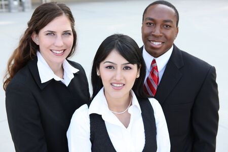 Attractive business men and women at office buildingの写真素材