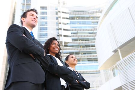 A diverse attractive man and woman business team at office building