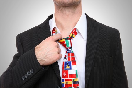 Business man with international global flag tie の写真素材