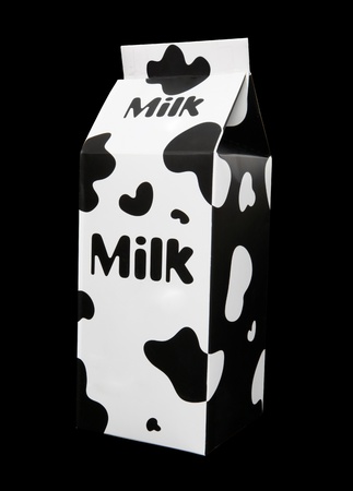 A milk carton with cow pattern over black backgroundの写真素材