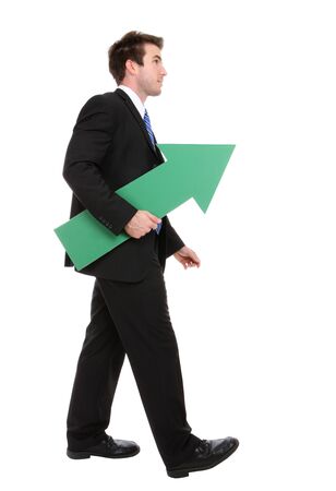 A business man holding a green arrow up indicating successの写真素材