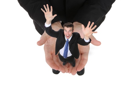 A business man holding a successful manの写真素材