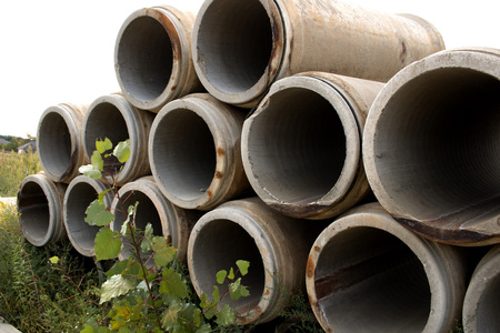 Sewer pipes stacked outside